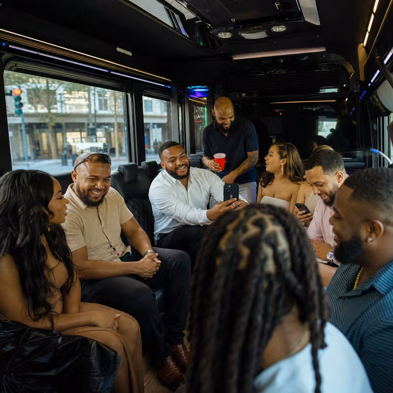 Black Mercedes Sprinter van staged for an Lakewood Birthday Transportation group