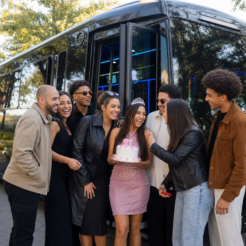 Party bus interior with wraparound leather seating and LED lighting in Lakewood