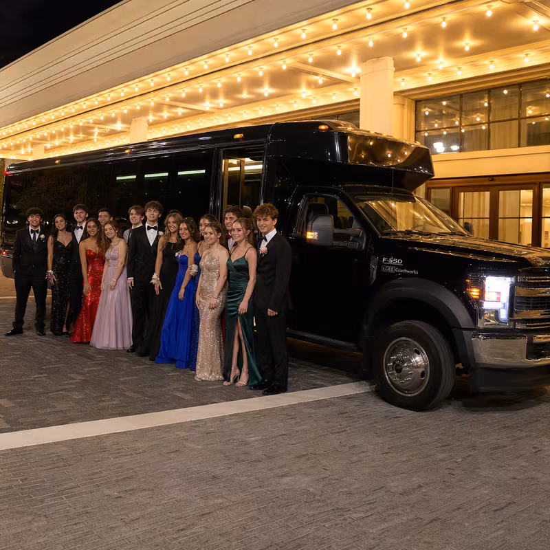Party bus interior with wraparound leather seating and LED lighting in Lakewood