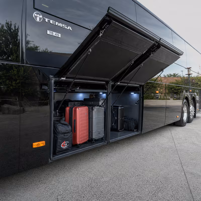 Party bus interior with wraparound leather seating and LED lighting in Lakewood